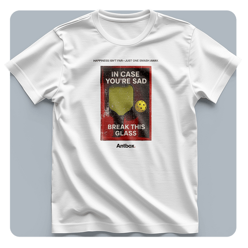 White t-shirt with a graphic design on a gray background